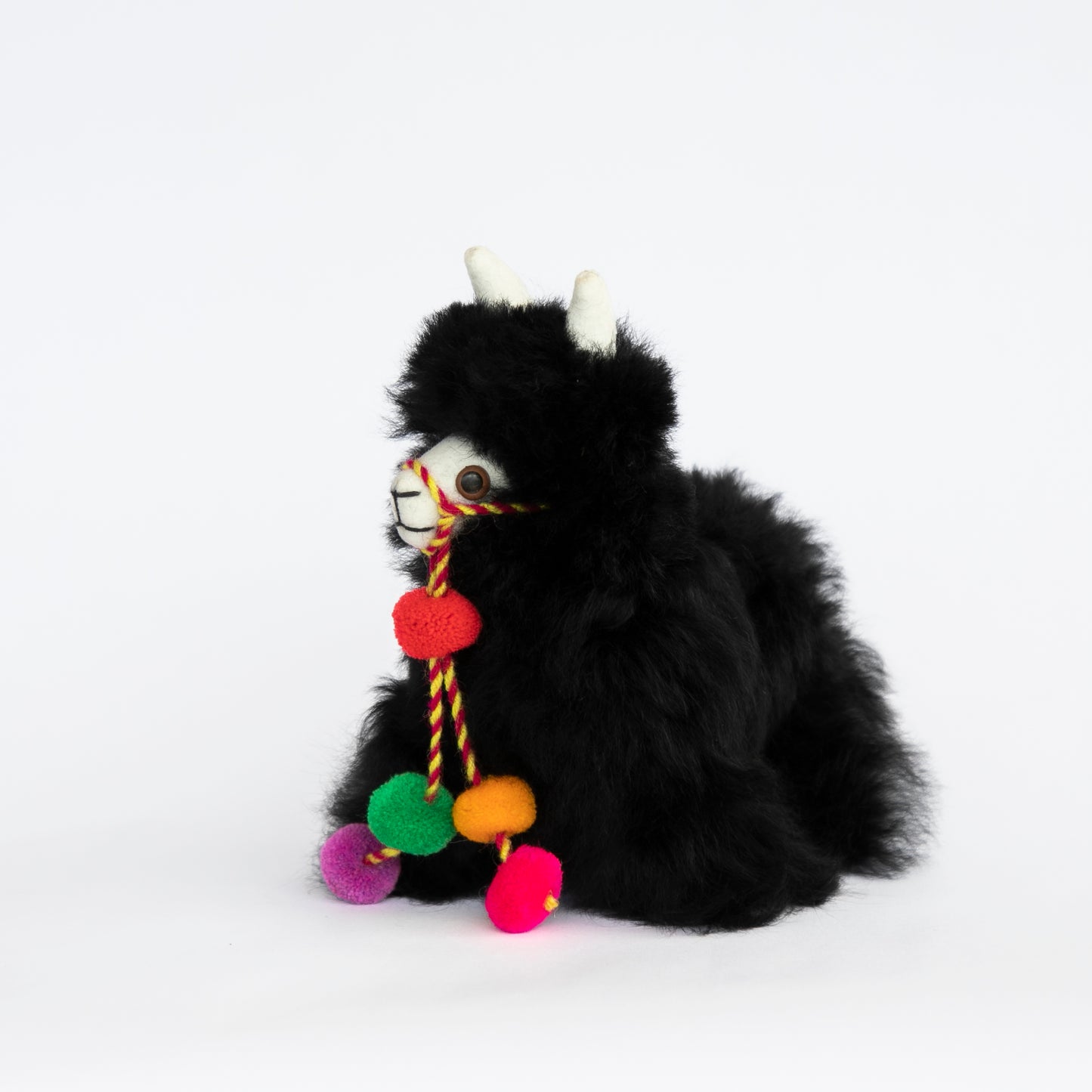 Black Pom Pom Llama Facing Left