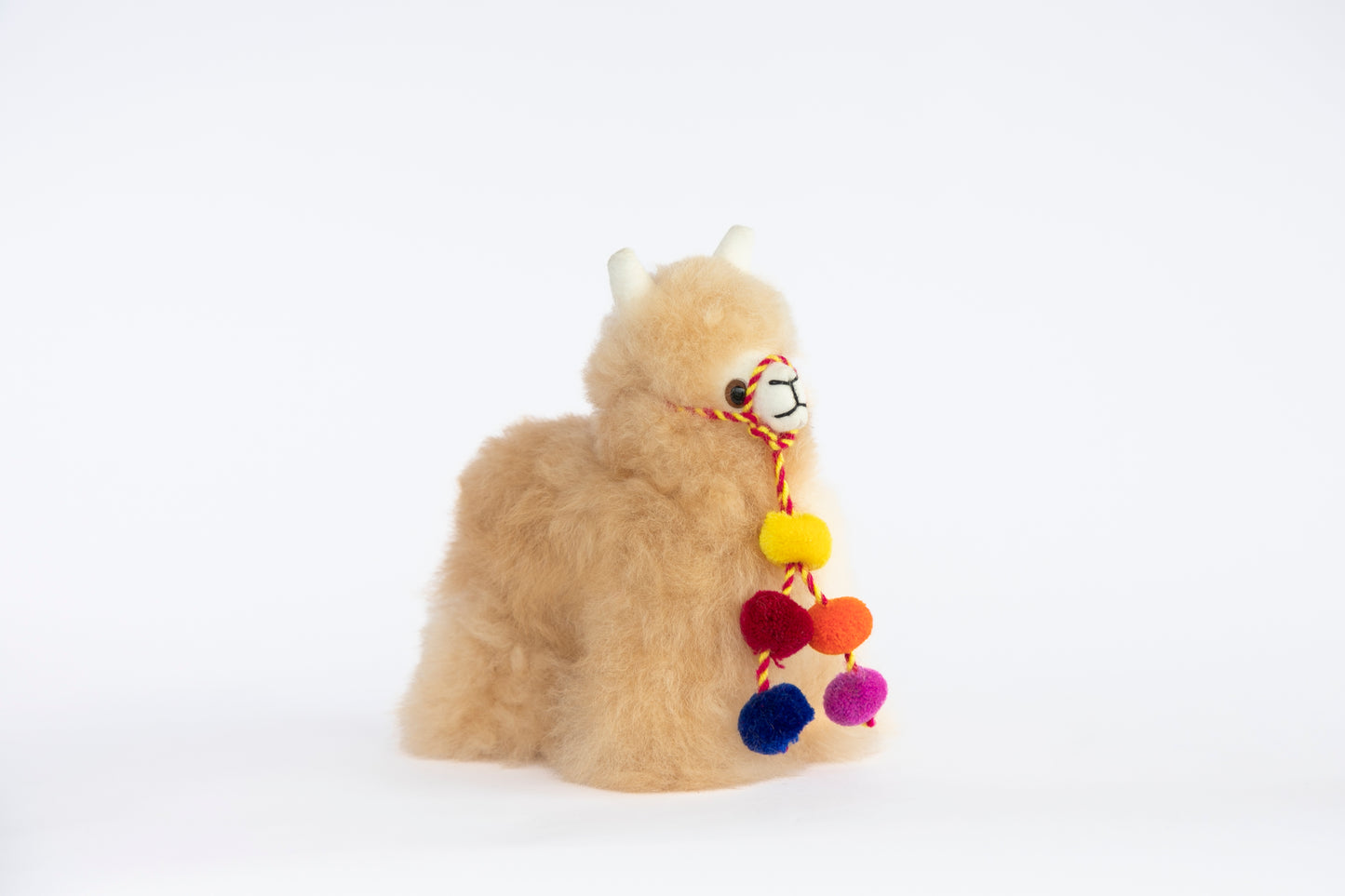 Creme Colored Pom Pom Llama Facing Right