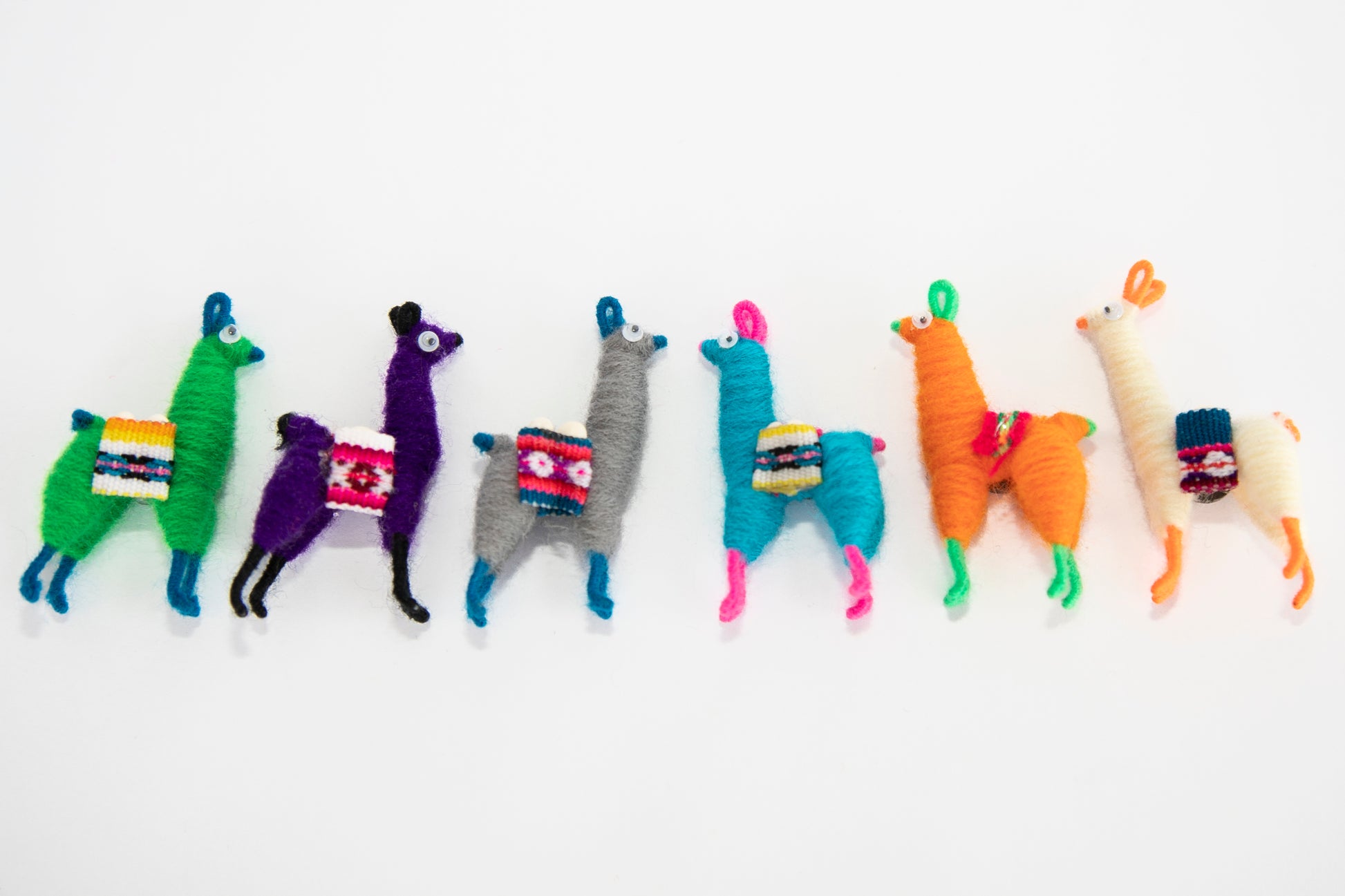 Peruvian Tiny Llama Magnets Facing Each Other 