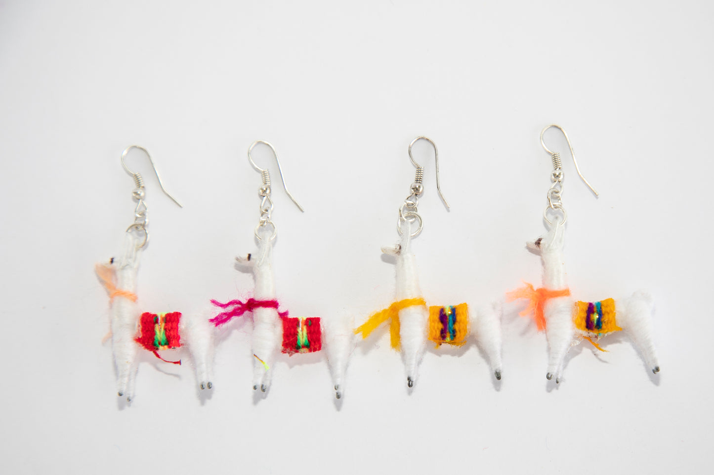 Peruvian White Llama Earrings Facing Left